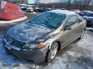 2008 Honda Civic Cpe EX-L with VIN 2HGFG12918H518666, listed as a IAAI auction lot 41373407 with 218,852 mi miles. Bid and sale history available at carsss.com. Image 20.