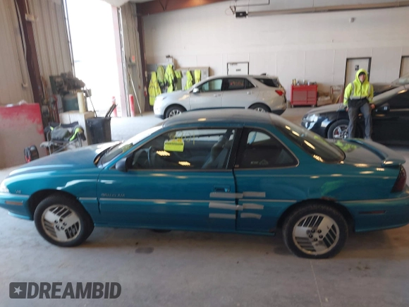 1994 Pontiac Grand Am z VIN 1G2NE15M5RM500643, wystawiony jako IAAI lot #42069901 z przebiegiem 77 129 mil mil oraz . Historia ofert i sprzedaży dostępna na DreamBid. Obrazek 14.