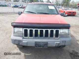 1996 Jeep Grand Cherokee Laredo with VIN 1J4FX58S4TC346218, listed as a IAAI auction lot 41943268 with 138,431 mi miles and . Bid and sale history available at DreamBid. Image 6.