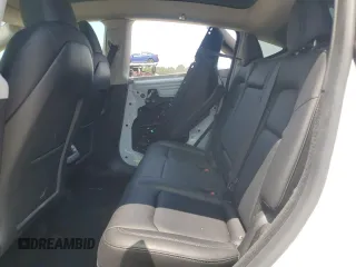 2024 Tesla Model Y с VIN 7SAYGDED3RF182859, выставлен на аукционе Copart как лот 61368825 с пробегом 13 914 миль миль и Списание • Salvage title. История ставок и продаж доступна на DreamBid. Изображение 10.