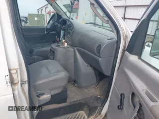 2004 Ford Econoline Cargo with VIN 1FTRE14WX4HA06537, listed as a IAAI auction lot 41745018 with 246,963 mi miles. Bid and sale history available at carsss.com. Image 5.