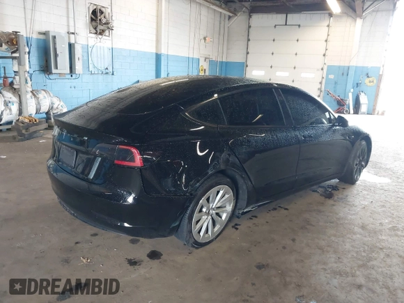 2023 Tesla Model 3 with VIN 5YJ3E1EA5PF396413, listed as a IAAI auction lot 42188639 with 57,717 mi miles and . Bid and sale history available at DreamBid. Image 4.