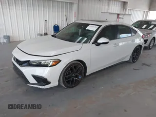 2022 Honda Civic Sport Touring z VIN 19XFL1H8XNE016822, wystawiony jako IAAI lot #42113420 z przebiegiem 30 361 mil mil oraz . Historia ofert i sprzedaży dostępna na DreamBid. Obrazek 17.