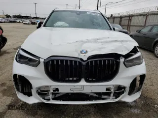 2020 BMW X5 xDrive40i z VIN 5UXCR6C02L9C46986, wystawiony jako Copart lot #59624005 z przebiegiem Nie podano mil oraz Szkoda całkowita • Salvage title. Historia ofert i sprzedaży dostępna na DreamBid. Obrazek 5.