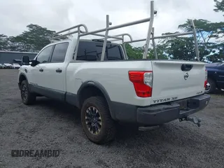 2017 Nissan Titan XD PRO-4X with VIN 1N6BA1F47HN517135, listed as a IAAI auction lot 41605323 with 108,984 mi miles. Bid and sale history available at carsss.com. Image 3.