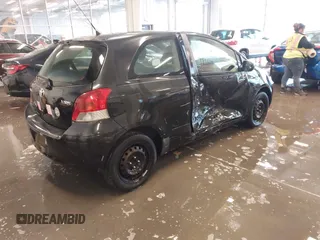 2011 Toyota Yaris with VIN JTDJT4K3XB5327229, listed as a IAAI auction lot 41275717 with 140,276 mi miles. Bid and sale history available at carsss.com. Image 4.