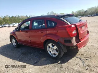 2009 Dodge Caliber SXT with VIN 1B3HB48A69D150199, listed as a Copart auction lot 51043165 with 218,125 mi miles and Clean Title. Bid and sale history available at DreamBid. Image 2.