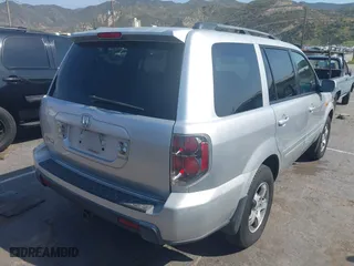 2007 Honda Pilot EX-L with VIN 5FNYF28587B012793, listed as a IAAI auction lot 41964324 with 230,128 mi miles. Bid and sale history available at carsss.com. Image 4.
