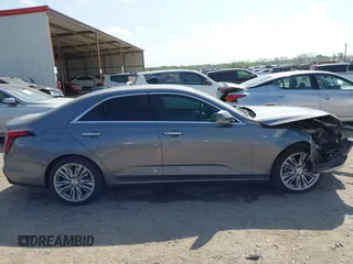 2022 Cadillac CT4 Premium Luxury z VIN 1G6DB5RK6N0118383, wystawiony jako IAAI lot #42042326 z przebiegiem 56 310 mil mil oraz . Historia ofert i sprzedaży dostępna na DreamBid. Obrazek 13.