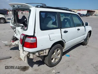 2001 Subaru Forester S w/Premium Pkg with VIN JF1SF65651H712410, listed as a IAAI auction lot 41782201 with 148,966 mi miles. Bid and sale history available at carsss.com. Image 4.