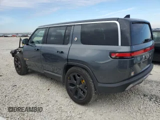 2022 Rivian R1S Launch Edition with VIN 7PDSGABL3NN000739, listed as a Copart auction lot 88127995 with 12,143 mi miles and Salvage Title. Bid and sale history available at DreamBid. Image 2.