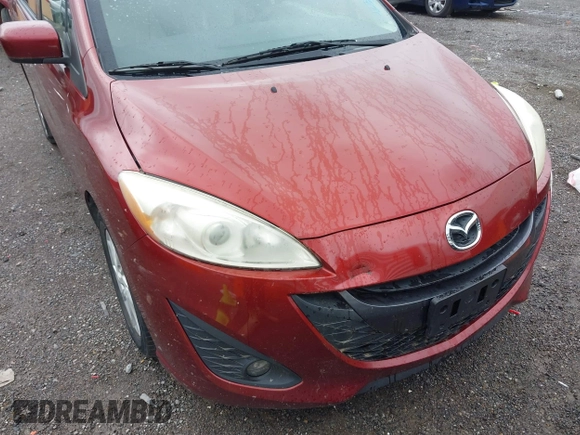 2012 Mazda 5 Grand Touring with VIN JM1CW2DLXC0134997, listed as a IAAI auction lot 42360574 with 230,951 mi miles and . Bid and sale history available at DreamBid. Image 6.