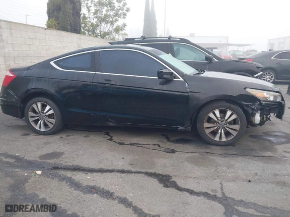 2010 Honda Accord Cpe LX-S with VIN 1HGCS1B30AA015874, listed as a IAAI auction lot 41654820 with 202,488 mi miles. Bid and sale history available at carsss.com. Image 13.