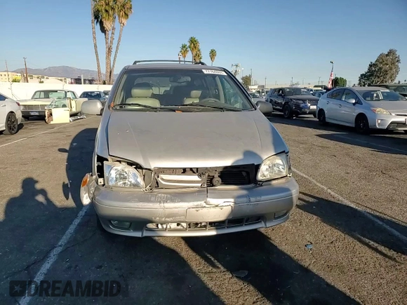 2002 Toyota Sienna LE with VIN 4T3ZF13C52U505287, listed as a Copart auction lot 77164884 with 0 mi miles and Salvage Title. Bid and sale history available at carsss.com. Image 12.