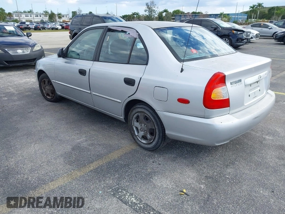2002 Hyundai Accent GL with VIN KMHCG45C52U378454, listed as a IAAI auction lot 41418653 with 173,564 mi miles. Bid and sale history available at carsss.com. Image 3.