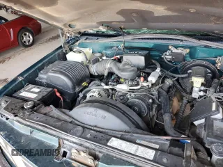 1997 GMC Sierra 1500 z VIN 2GTEK19RXV1501674, wystawiony jako Copart lot #59061595 z przebiegiem 138 998 mil mil oraz Szkoda całkowita • Salvage title. Historia ofert i sprzedaży dostępna na DreamBid. Obrazek 11.