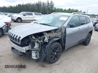 2014 Jeep Cherokee Latitude with VIN 1C4PJLCS1EW105984, listed as a IAAI auction lot 42242732 with 89,325 mi miles and . Bid and sale history available at DreamBid. Image 2.