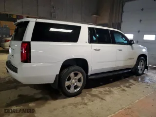 2020 Chevrolet Suburban LT with VIN 1GNSKHKC2LR187449, listed as a Copart auction lot 45943195 with 100,559 mi miles and Salvage Title. Bid and sale history available at carsss.com. Image 3.