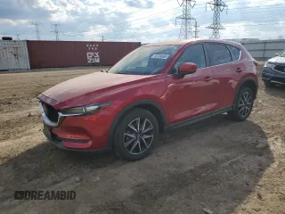 2018 Mazda CX-5 Touring with VIN JM3KFBCM8J0459657, listed as a Copart auction lot 50789585 with 72,657 mi miles and Salvage Title. Bid and sale history available at carsss.com. Image 1.