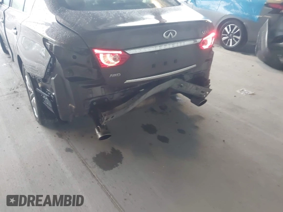 2015 Infiniti Q50 Premium z VIN JN1BV7AR0FM393387, wystawiony jako IAAI lot #42257850 z przebiegiem 176 436 mil mil oraz . Historia ofert i sprzedaży dostępna na DreamBid. Obrazek 6.