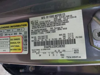 2013 Ford Fusion SE Hybrid with VIN 3FA6P0LU3DR338282, listed as a IAAI auction lot 41973498 with 187,375 mi miles. Bid and sale history available at carsss.com. Image 9.