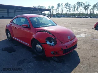 2012 Volkswagen Beetle 2.5L PZEV with VIN 3VWJP7AT0CM649068, listed as a IAAI auction lot 41684217 with 135,829 mi miles. Bid and sale history available at carsss.com. Image 1.