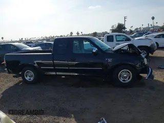 1998 Ford F-150 XL with VIN 1FTRX17L9WNA67717, listed as a IAAI auction lot 41604900 with 133,457 mi miles and . Bid and sale history available at DreamBid. Image 14.