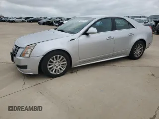 2012 Cadillac CTS Luxury z VIN 1G6DE5E52C0138229, wystawiony jako Copart lot #49880475 z przebiegiem 143 315 mil mil oraz Czysty tytuł • Clean title. Historia ofert i sprzedaży dostępna na DreamBid. Obrazek 1.