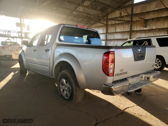 2009 Nissan Frontier SE with VIN 1N6AD07U49C405644, listed as a Copart auction lot 44342525 with 212,826 mi miles and Salvage Title. Bid and sale history available at carsss.com. Image 2.