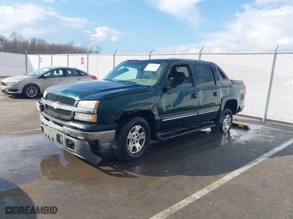 2003 Chevrolet Avalanche with VIN 3GNEK13T13G299307, listed as a IAAI auction lot 41663449 with 242,862 mi miles. Bid and sale history available at carsss.com. Image 2.