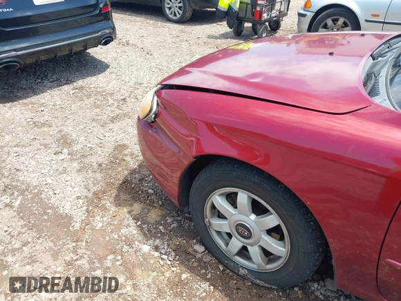 2003 Kia Spectra z VIN KNAFB121X35293054, wystawiony jako IAAI lot #42274932 z przebiegiem 108 978 mil mil oraz . Historia ofert i sprzedaży dostępna na DreamBid. Obrazek 12.