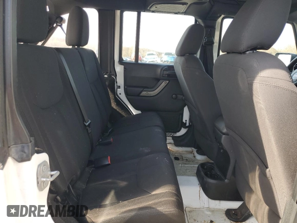 2016 Jeep Wrangler Unlimited Sport with VIN 1C4BJWDG4GL235252, listed as a Copart auction lot 54218885 with 118,849 mi miles and Salvage Title. Bid and sale history available at DreamBid. Image 11.