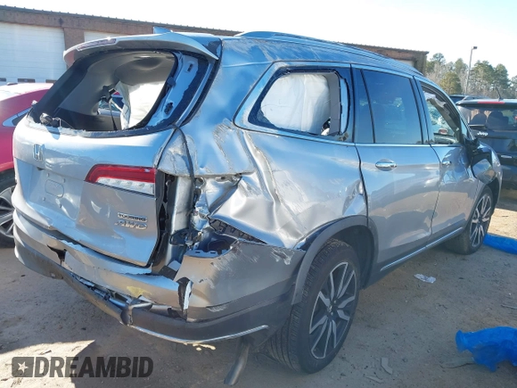 2019 Honda Pilot Touring 7-Passenger with VIN 5FNYF6H60KB038846, listed as a IAAI auction lot 41339385 with Not provided miles and . Bid and sale history available at DreamBid. Image 4.