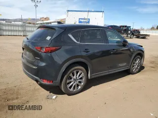 2020 Mazda CX-5 Grand Touring with VIN JM3KFBDMXL1735154, listed as a Copart auction lot 49313585 with 82,750 mi miles and Salvage Title. Bid and sale history available at DreamBid. Image 3.