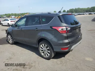 2018 Ford Escape Titanium with VIN 1FMCU9J91JUA47420, listed as a Copart auction lot 61846795 with 77,246 mi miles and Salvage title. Bid and sale history available at DreamBid. Image 2.