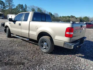 2005 Ford F-150 XLT with VIN 1FTPX12555NB05846, listed as a IAAI auction lot 41857253 with 226,219 mi miles. Bid and sale history available at carsss.com. Image 3.