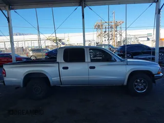 2003 Dodge Dakota SLT with VIN 1D7HL48N13S294573, listed as a IAAI auction lot 41291127 with 227,355 mi miles. Bid and sale history available at carsss.com. Image 13.