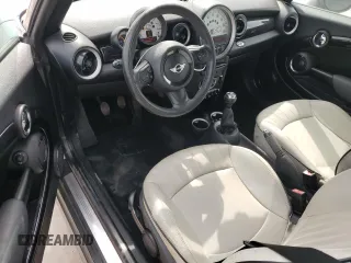 2011 MINI Convertible with VIN WMWZN3C53BTZ89332, listed as a Copart auction lot 45945515 with 25,809 mi miles and Salvage title. Bid and sale history available at DreamBid. Image 8.