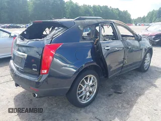 2014 Cadillac SRX Performance Collection with VIN 3GYFNCE31ES599632, listed as a IAAI auction lot 42757876 with Not provided miles and . Bid and sale history available at DreamBid. Image 4.