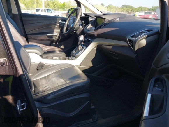 2013 Ford C-Max Energi SEL with VIN 1FADP5CU2DL510935, listed as a IAAI auction lot 42142613 with 162,788 mi miles. Bid and sale history available at carsss.com. Image 5.