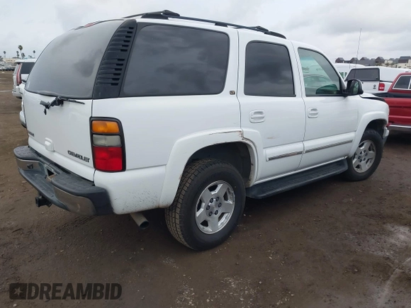 2004 Chevrolet Tahoe LS with VIN 1GNEC13T84J178237, listed as a IAAI auction lot 41742040 with 205,246 mi miles. Bid and sale history available at carsss.com. Image 4.