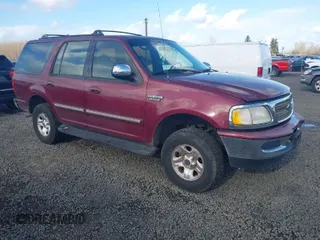 1997 Ford Expedition XLT z VIN 1FMFU18L6VLA48106, wystawiony jako IAAI lot #41729974 z przebiegiem 308 370 mil mil oraz . Historia ofert i sprzedaży dostępna na DreamBid. Obrazek 1.