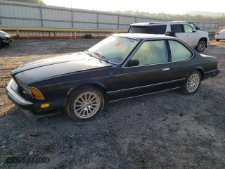 1987 BMW 6 Series 635CSi with VIN WBAEC8401H3265362, listed as a Copart auction lot 74726494 with 148,470 mi miles and Salvage Title. Bid and sale history available at carsss.com. Image 1.
