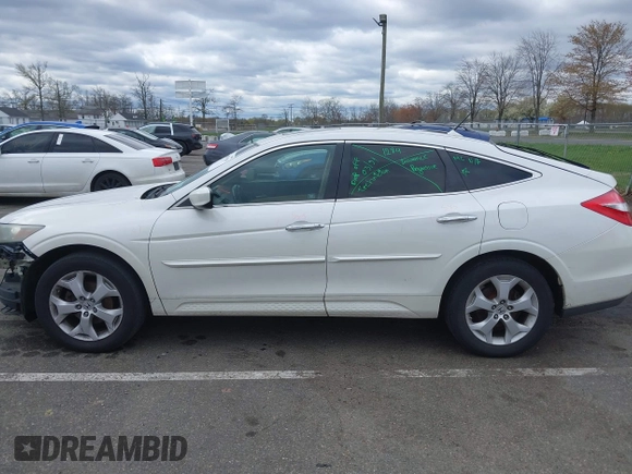 2010 Honda Crosstour EX-L z VIN 5J6TF2H57AL005231, wystawiony jako IAAI lot #42029109 z przebiegiem 134 451 mil mil oraz . Historia ofert i sprzedaży dostępna na DreamBid. Obrazek 14.