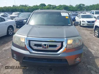 2009 Honda Pilot EX-L with VIN 5FNYF48569B050795, listed as a IAAI auction lot 42149732 with 281,504 mi miles. Bid and sale history available at carsss.com. Image 6.