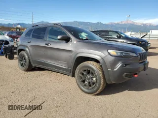 2020 Jeep Cherokee Trailhawk Elite with VIN 1C4PJMBN5LD549377, listed as a Copart auction lot 72636844 with 62,549 mi miles and Salvage title. Bid and sale history available at DreamBid. Image 4.