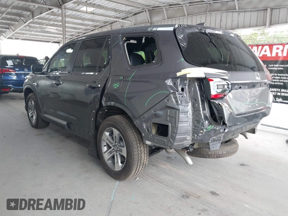 2025 Honda Pilot EX-L z VIN 5FNYG2H40SB019525, wystawiony jako IAAI lot #42190029 z przebiegiem 10 794 mil mil oraz . Historia ofert i sprzedaży dostępna na DreamBid. Obrazek 3.