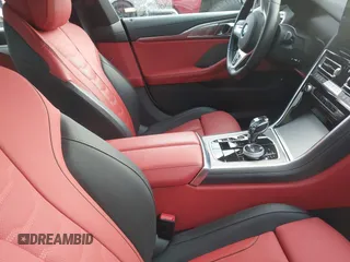 2023 BMW 8 Series 840i z VIN WBAGV2C02PCL77961, wystawiony jako IAAI lot #41156644 z przebiegiem 7059 mil mil oraz . Historia ofert i sprzedaży dostępna na DreamBid. Obrazek 5.