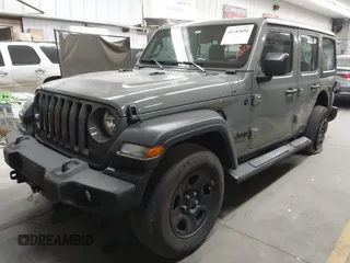 2022 Jeep Wrangler Unlimited Sport with VIN 1C4HJXDG0NW117632, listed as a IAAI auction lot 41185850 with 18,298 mi miles and . Bid and sale history available at DreamBid. Image 2.