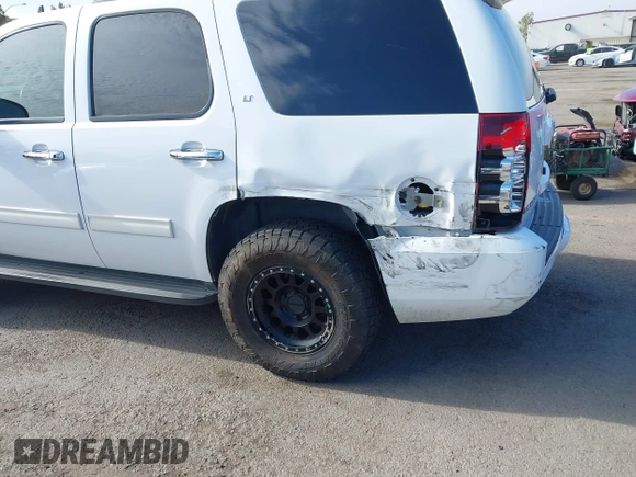 2011 Chevrolet Tahoe LT with VIN 1GNSCBE0XBR374156, listed as a IAAI auction lot 42659337 with 201,514 mi miles and . Bid and sale history available at DreamBid. Image 6.
